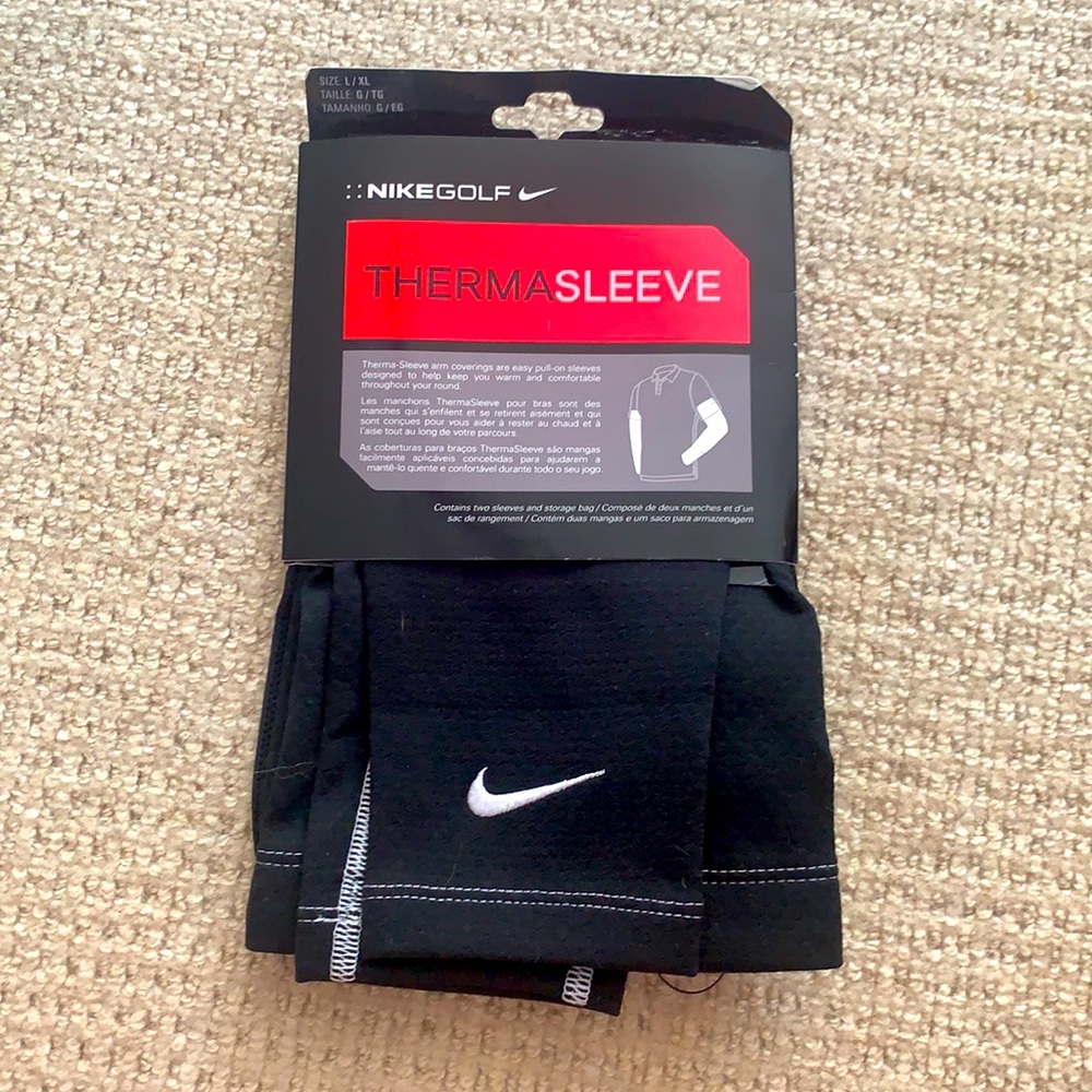 Golfers!!  NEW Black NikeGolf ThermaSleeve. Unworn.